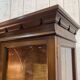 English display cabinet with two sections made of yew from the 1980s.
