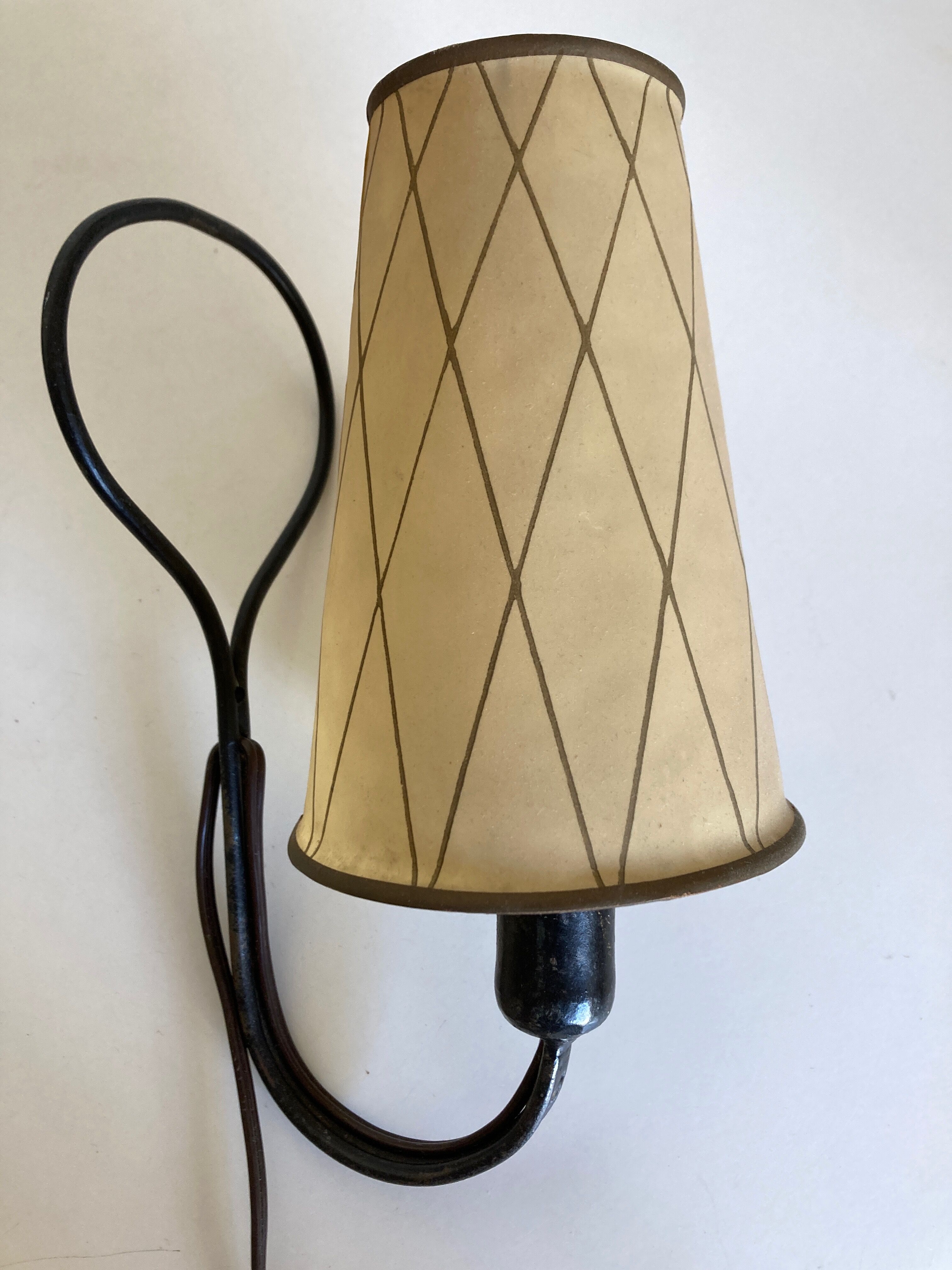 Art deco beaten iron wall lamp