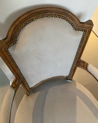 Pair of cabriolet armchairs in light grey and dark grey Louis XV style.