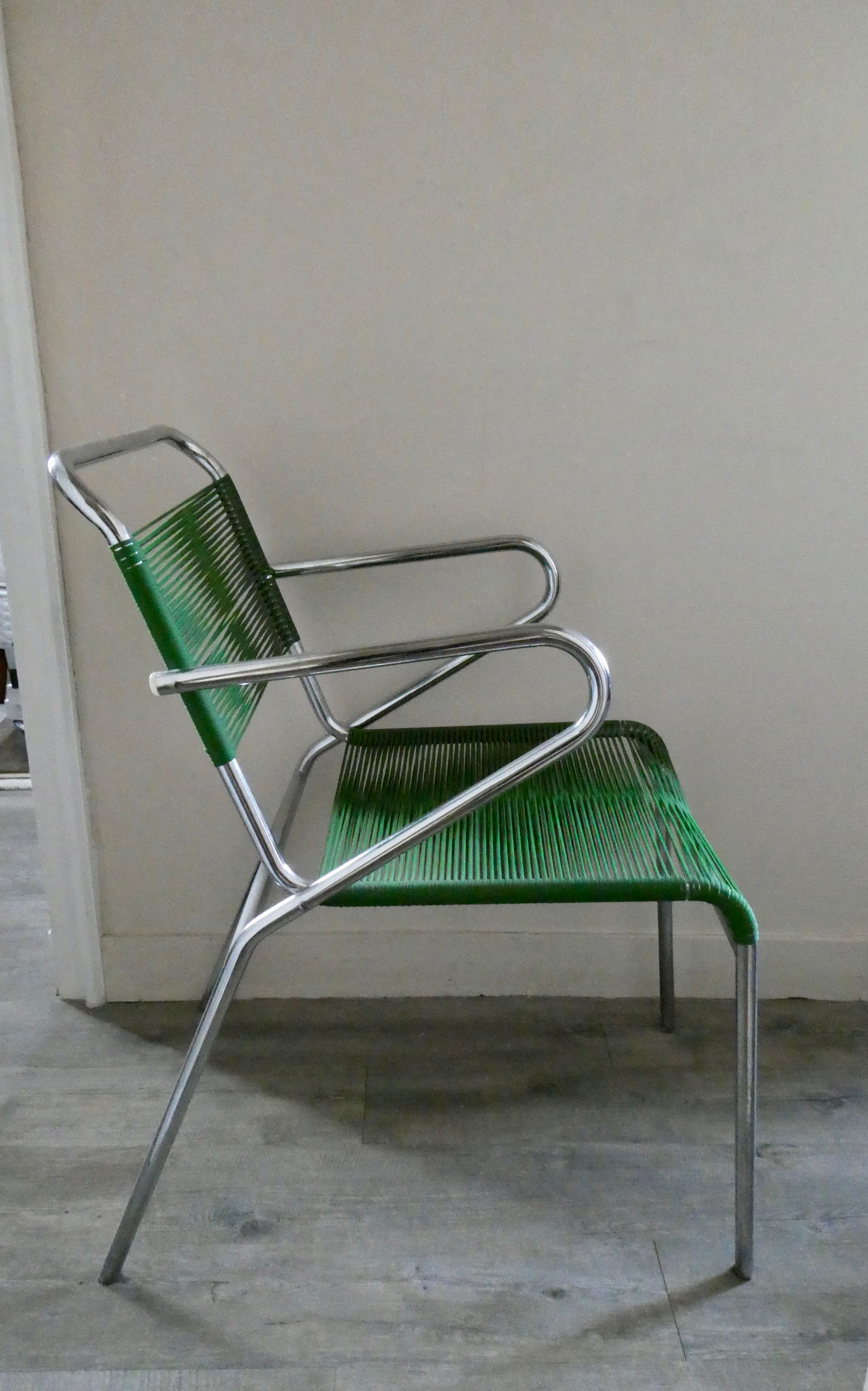 Metal chair and ropes