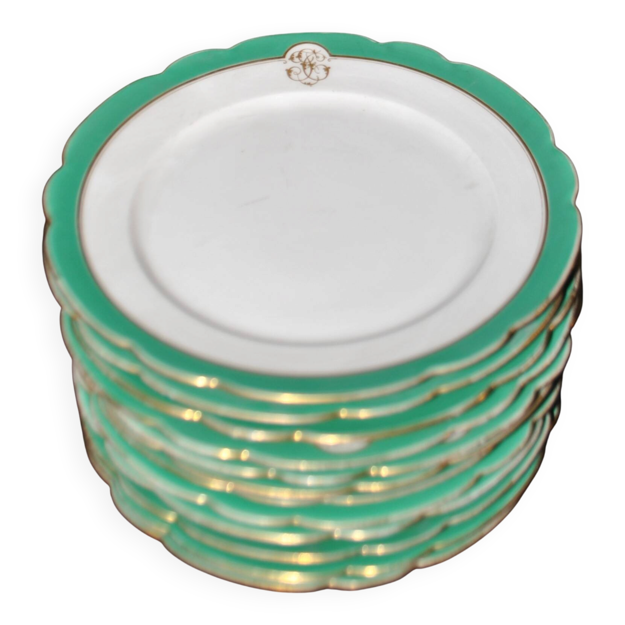 Paris porcelain set of 12 flat plates with green border and gold monogram JC.