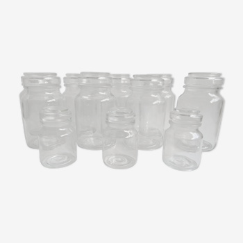 Set of 11 jars in transparent moulded glass