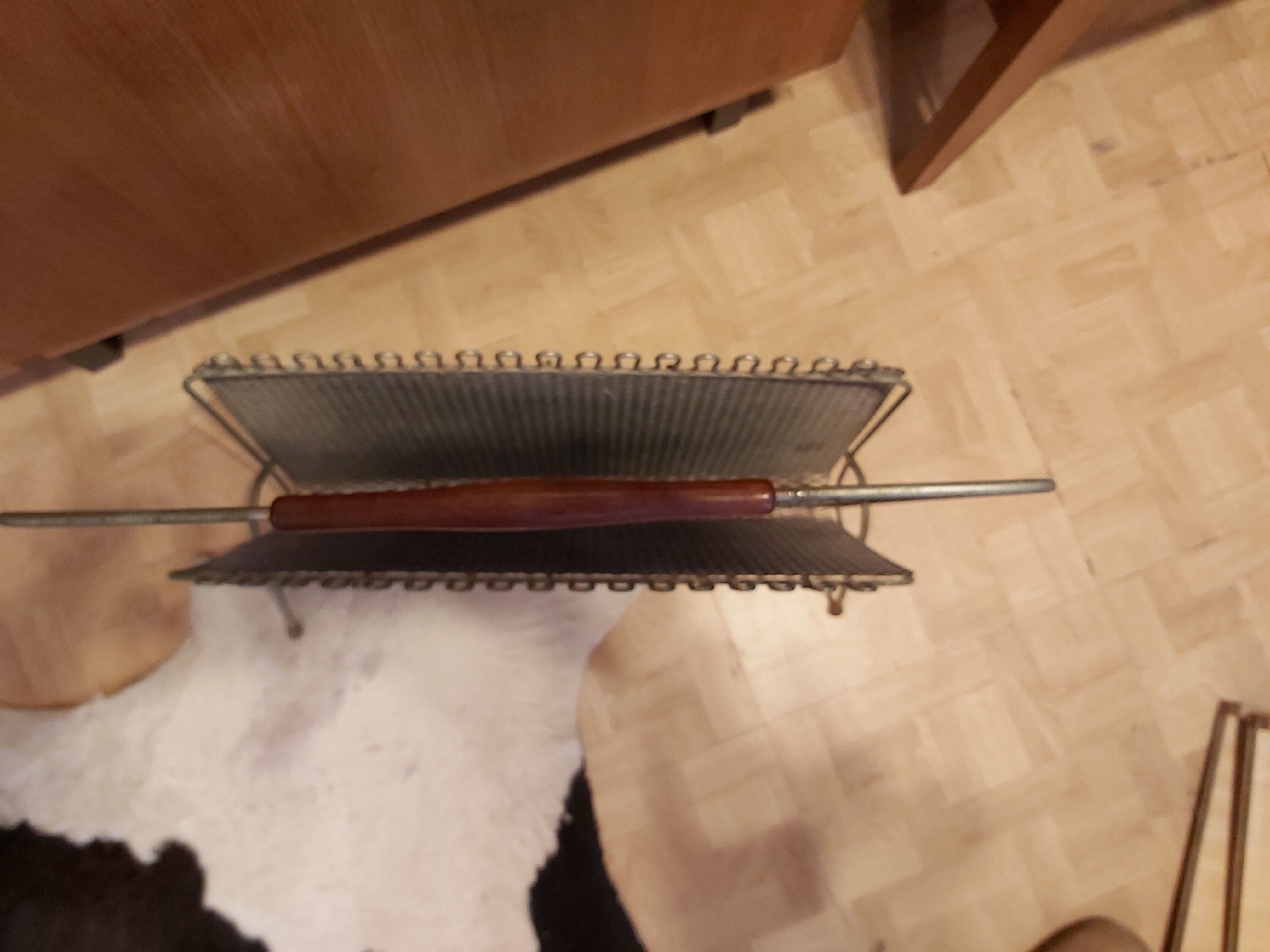 Modernist magazine rack in metal and wood