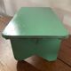 Vintage wooden footrest in mint green.
