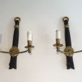 Pair of Black Lacquered Bronze Wall Lamps with Lions' Head Decorations. Around 1970