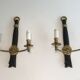 Pair of Black Lacquered Bronze Wall Lamps with Lions' Head Decorations. Around 1970