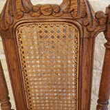 Set of 4 vintage carved cane chairs