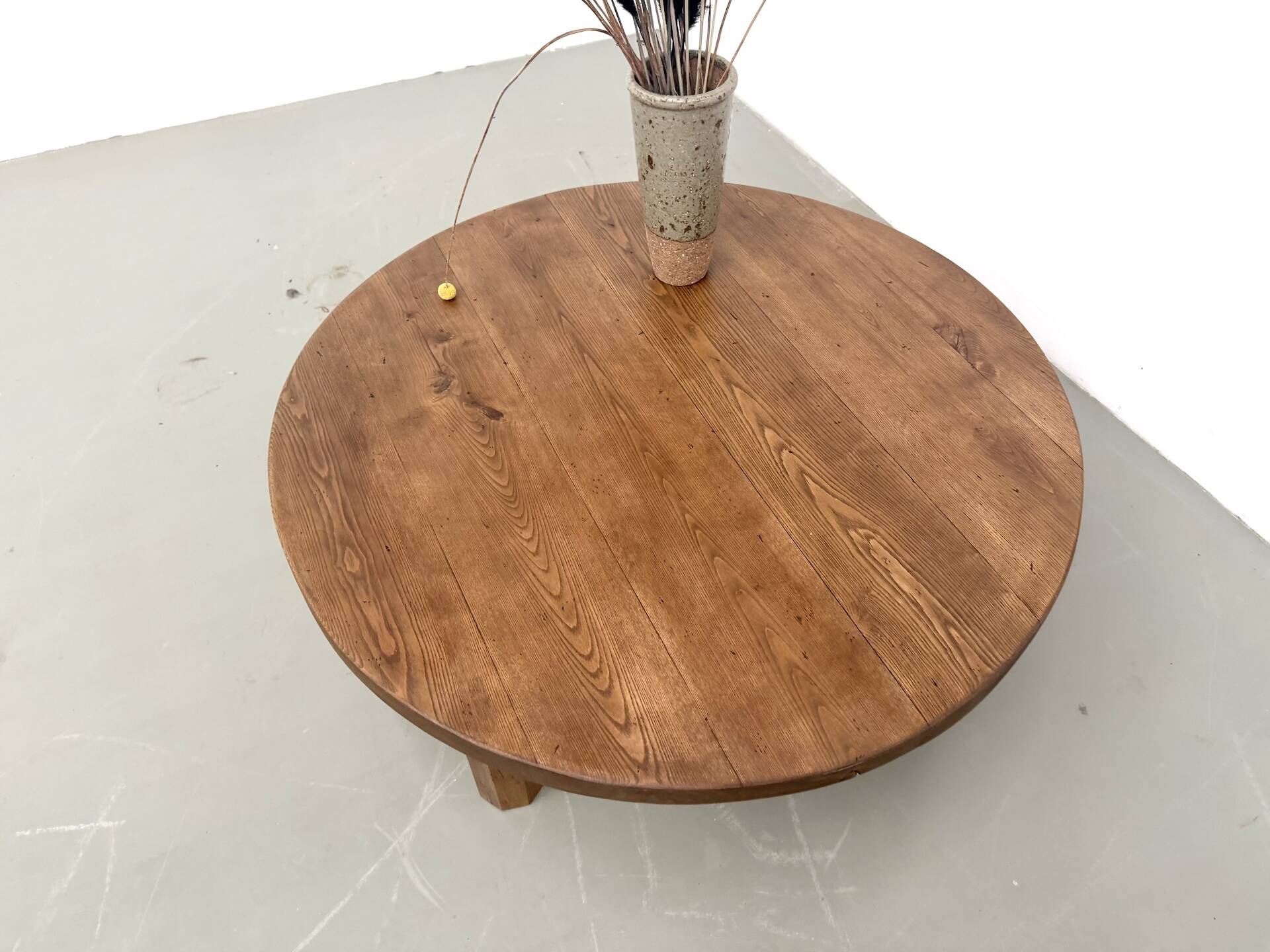 Round coffee table in solid oak, octagonal legs, France, 1950s.