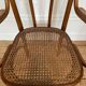 Old thonet armchair in curved wood and rattan cane
