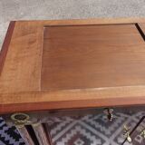 Flamed mahogany enfilade with sea green marble in Empire style.