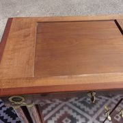 Flamed mahogany enfilade with sea green marble in Empire style.