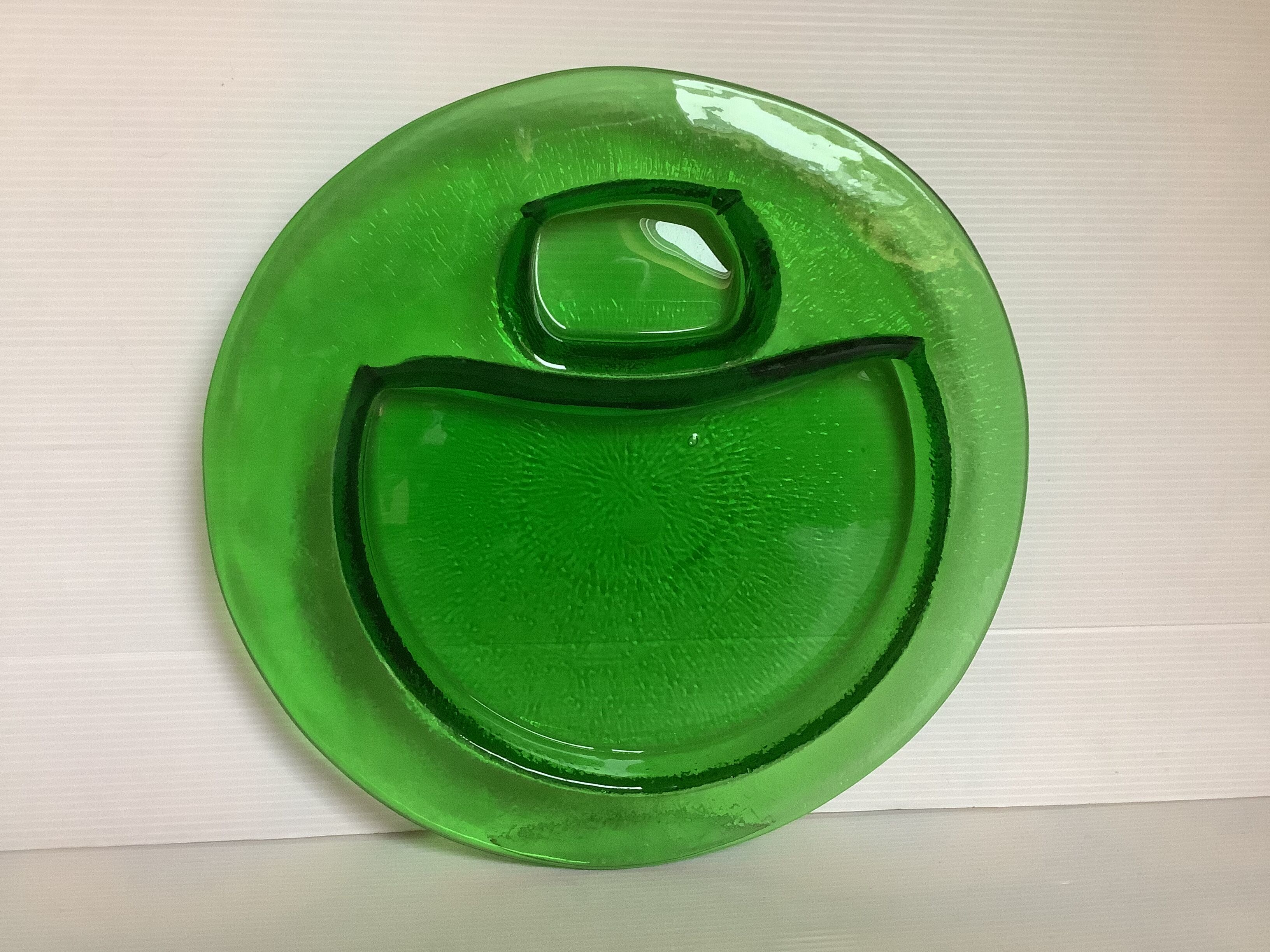Handcrafted thick green glass empty pocket