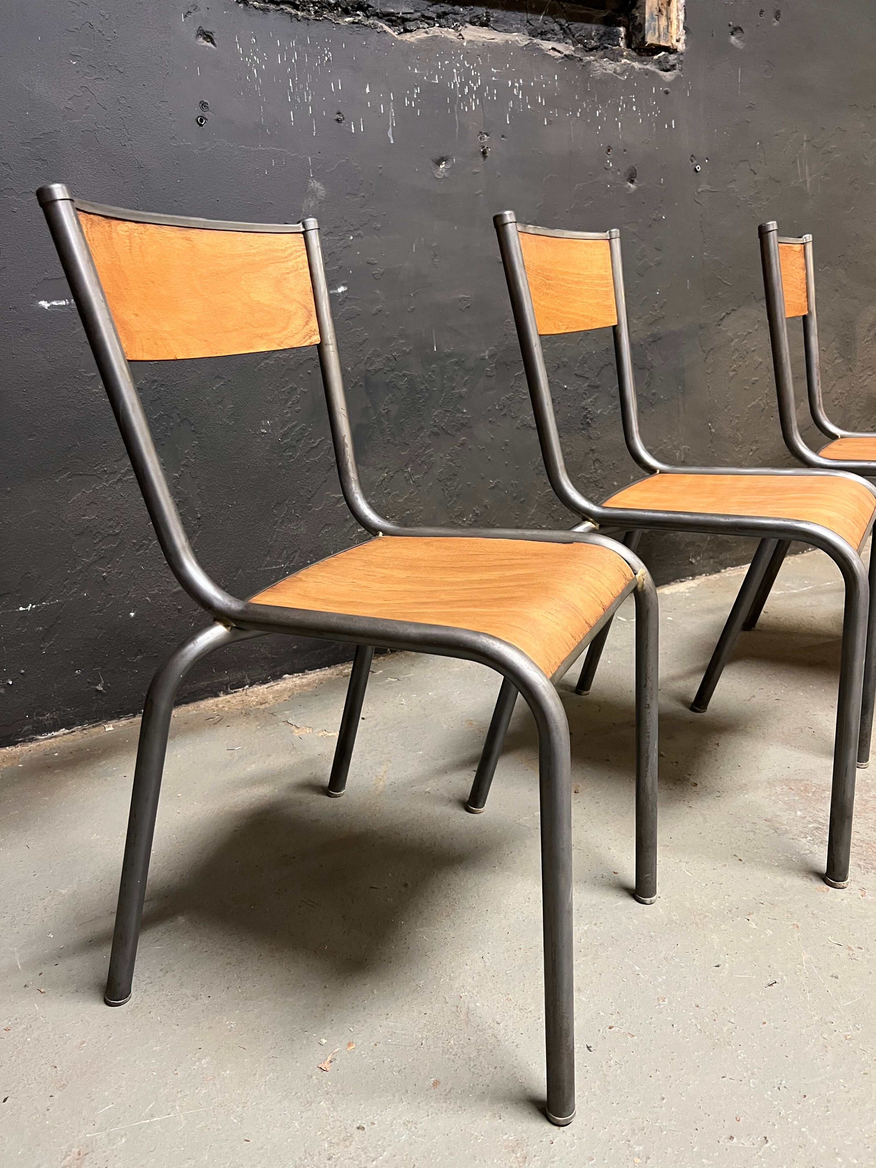 Set of Mulca school chairs patinated graphite.