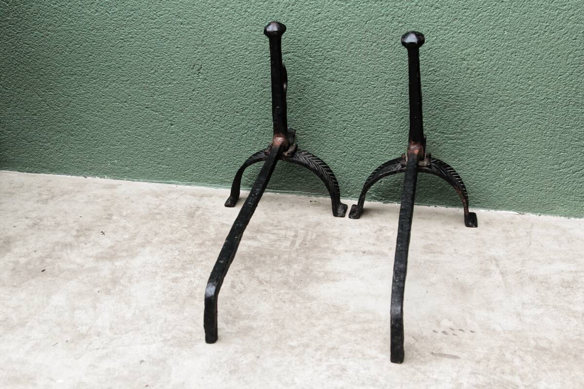 Pair of wrought iron andirons; 17th century