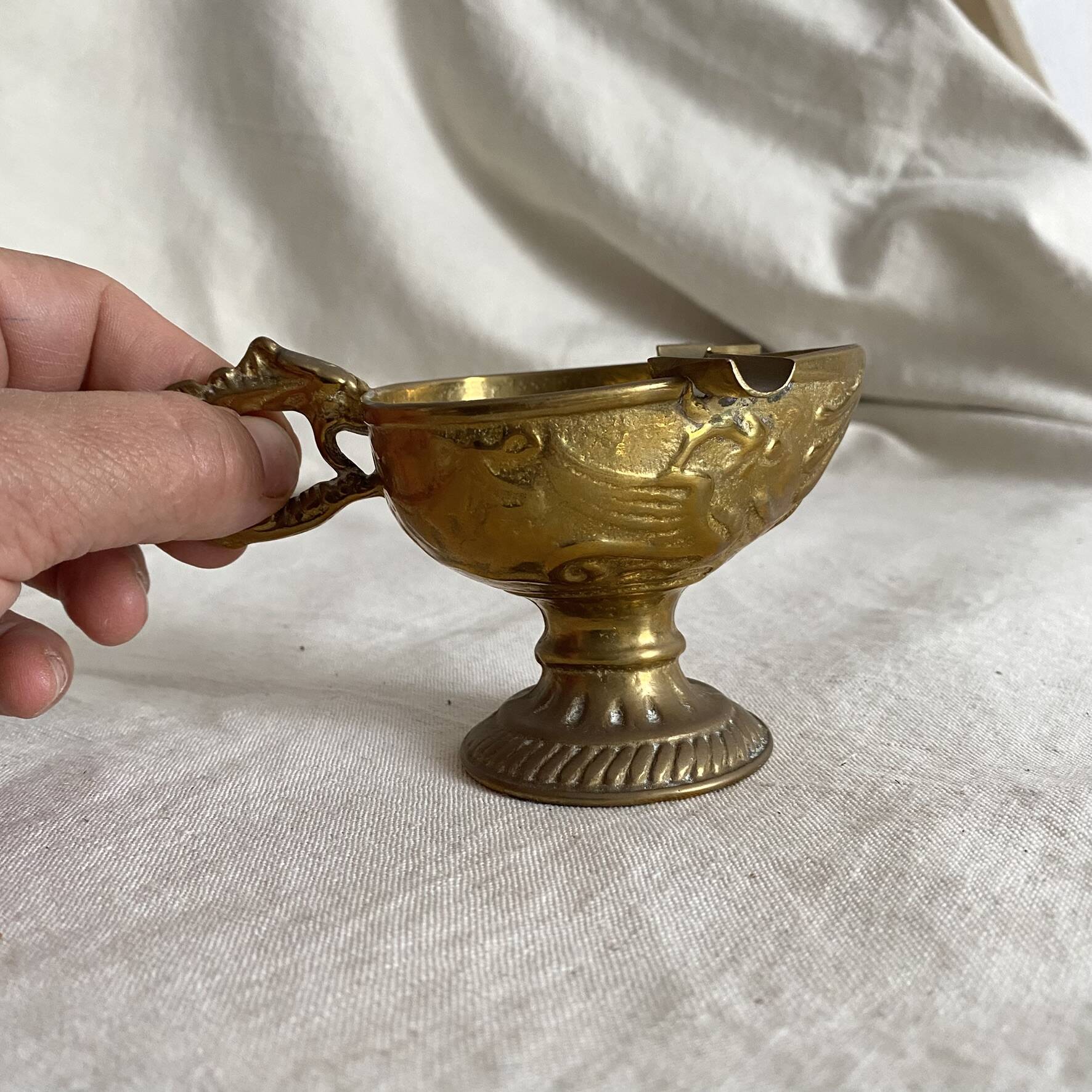Antique embossed brass ashtray