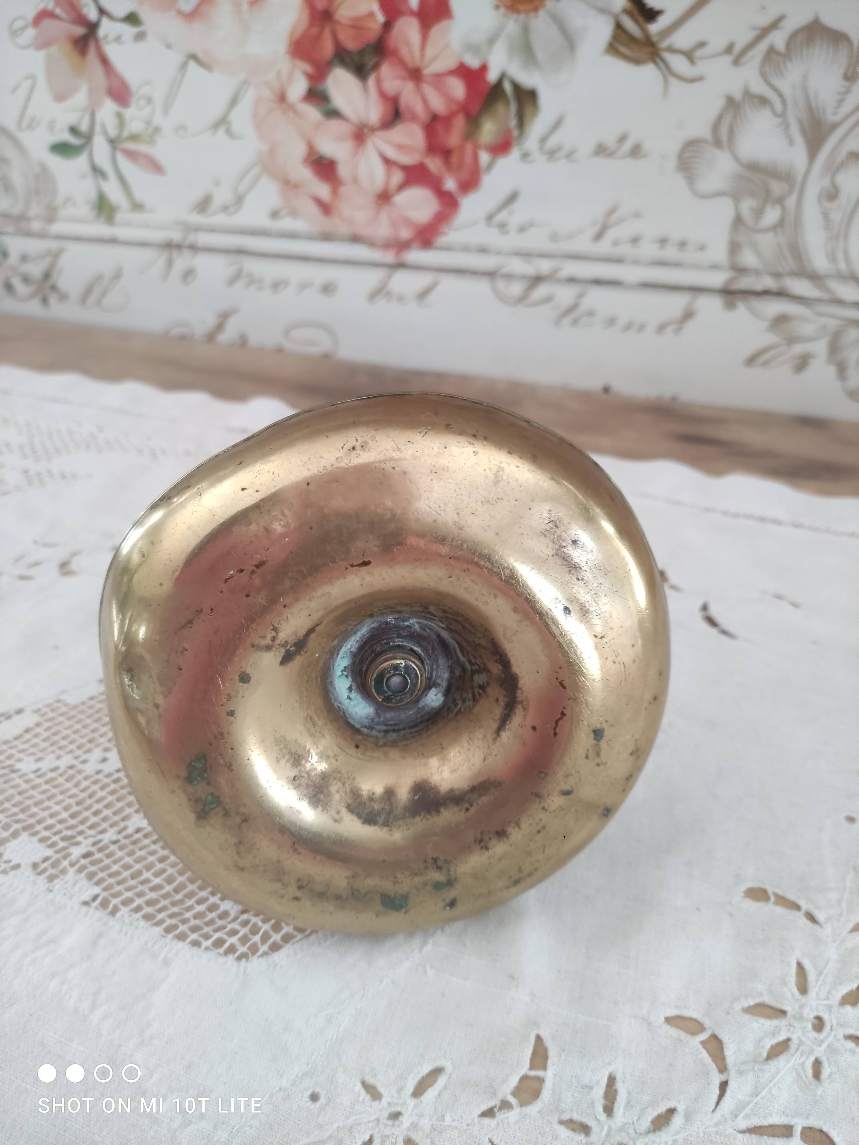 Brass push candle holder on frame