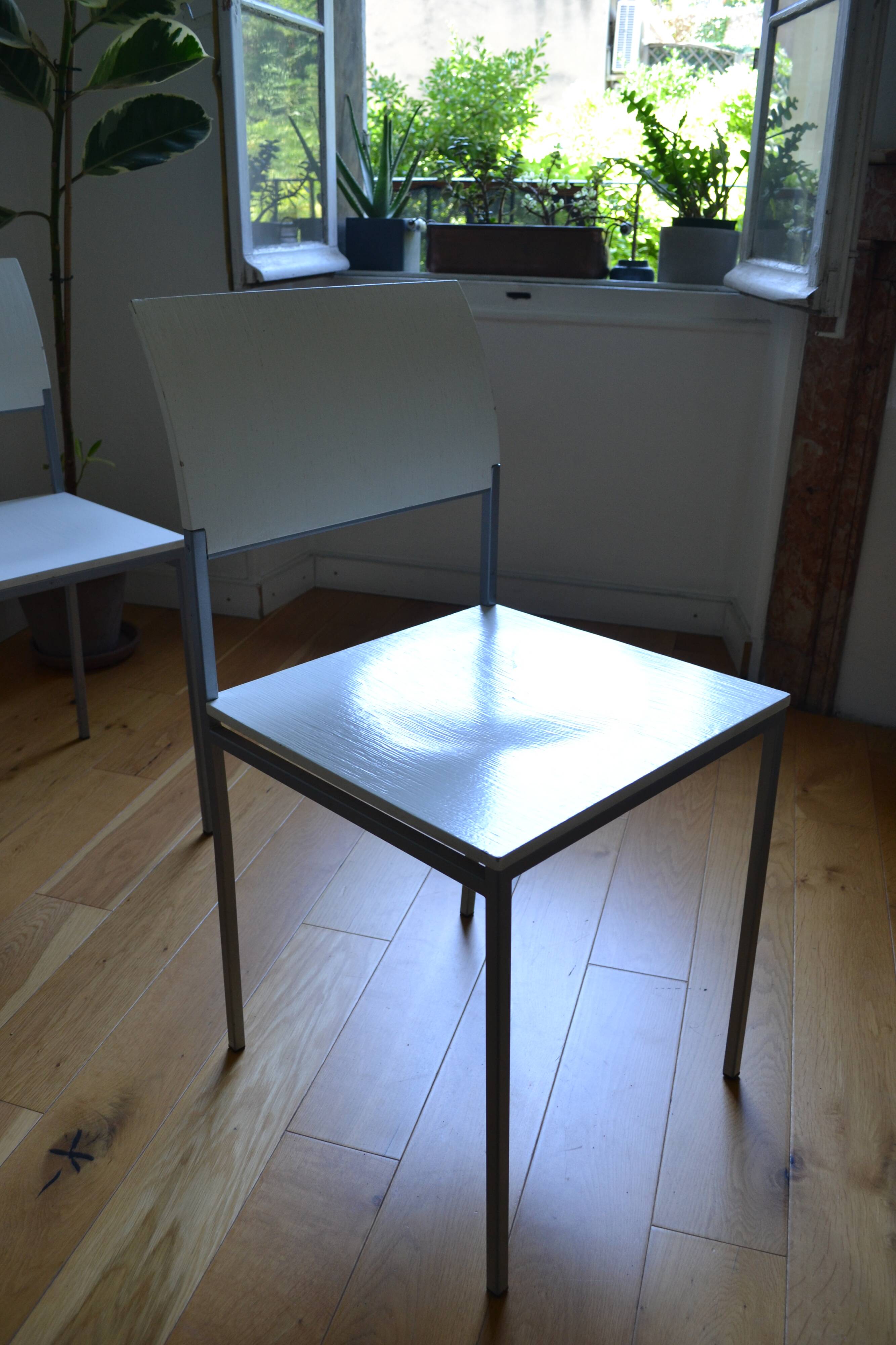 Set of 4 vintage metal and wood chairs from the 1990s.