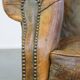 Green antique English cowhide leather armchair on wheels