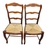 2 chaises à manger bois massif sculpté paillées Louis XV coquille
