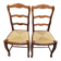 2 dining chairs with carved solid wood and rush seats in Louis XV shell style.