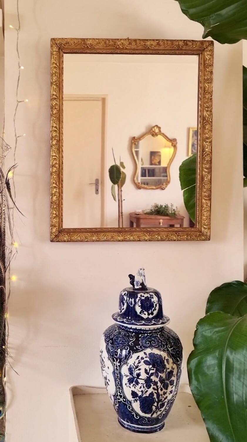 Mirror in wood and gilded stucco