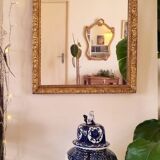 Mirror in wood and gilded stucco