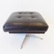 Danish black leather armchair with ottoman 70s