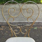 Vintage heart chair from the 1950s Hollywood Regency in gold metal.