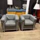 Pair of Cassina LC2 armchairs in grey leather.