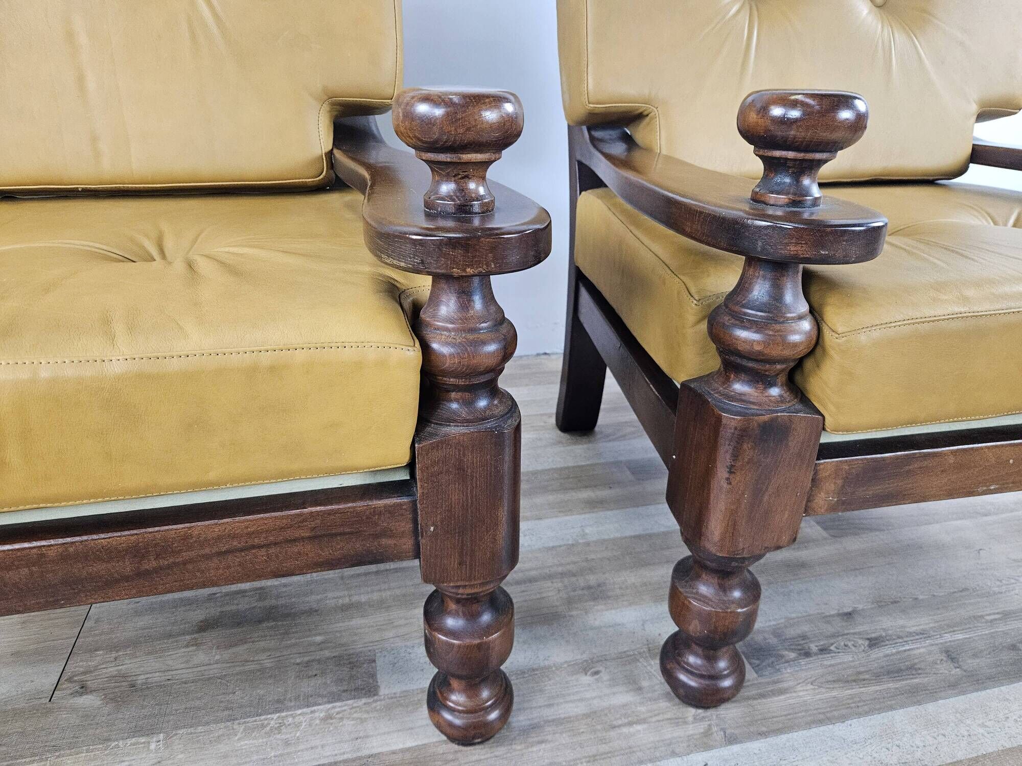 1980s leather and solid wood armchairs