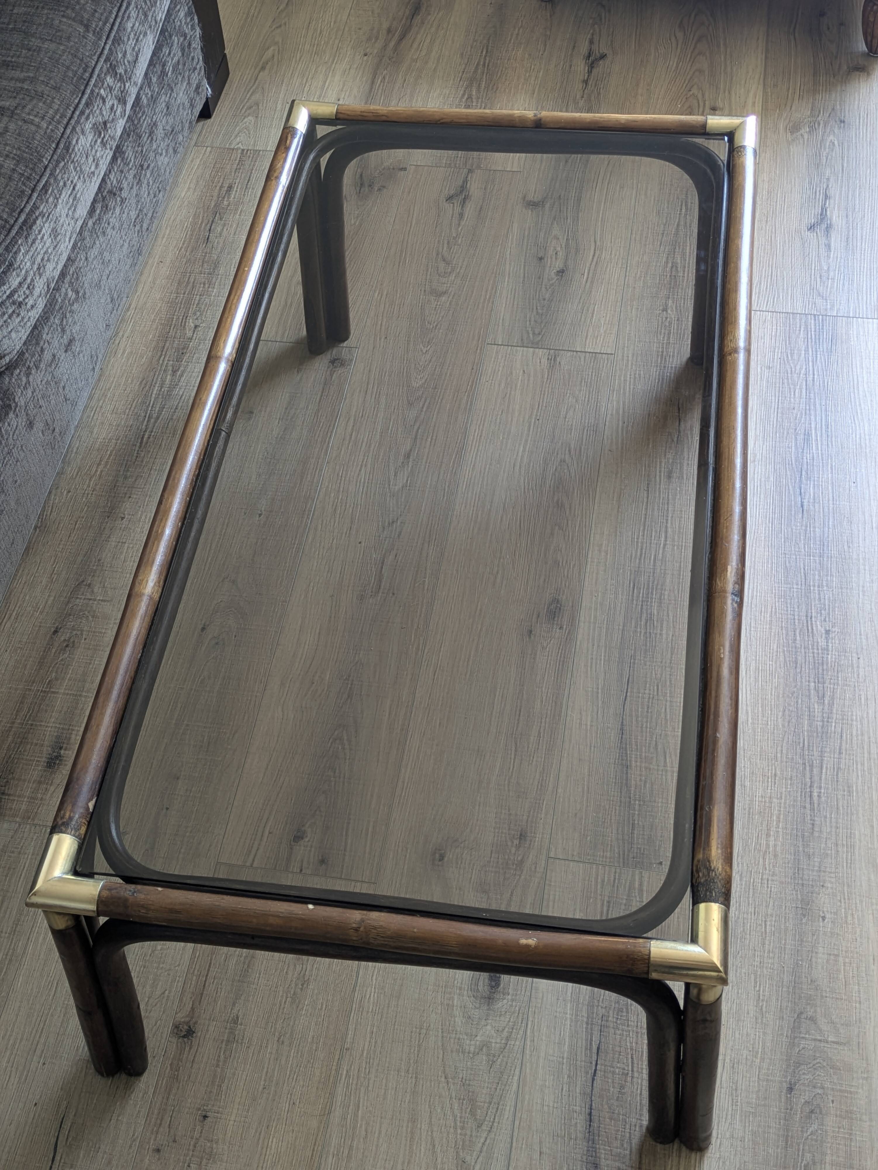 Bamboo coffee table with brass corners and smoked glass