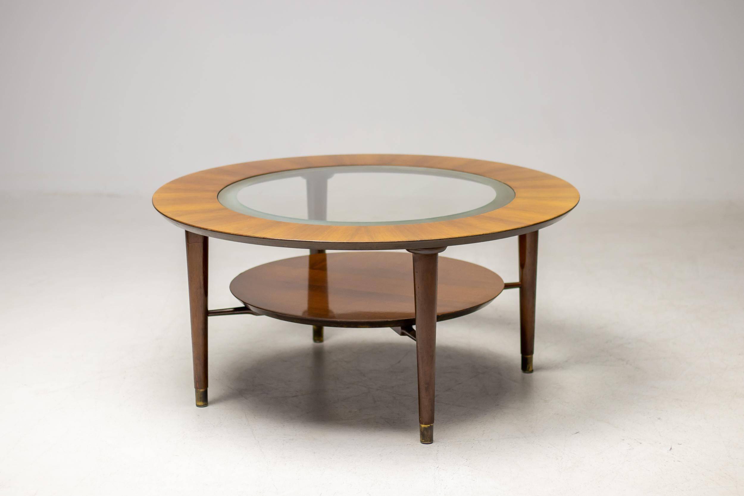 Sculptural coffee table in walnut and glass, Italy, 1950.