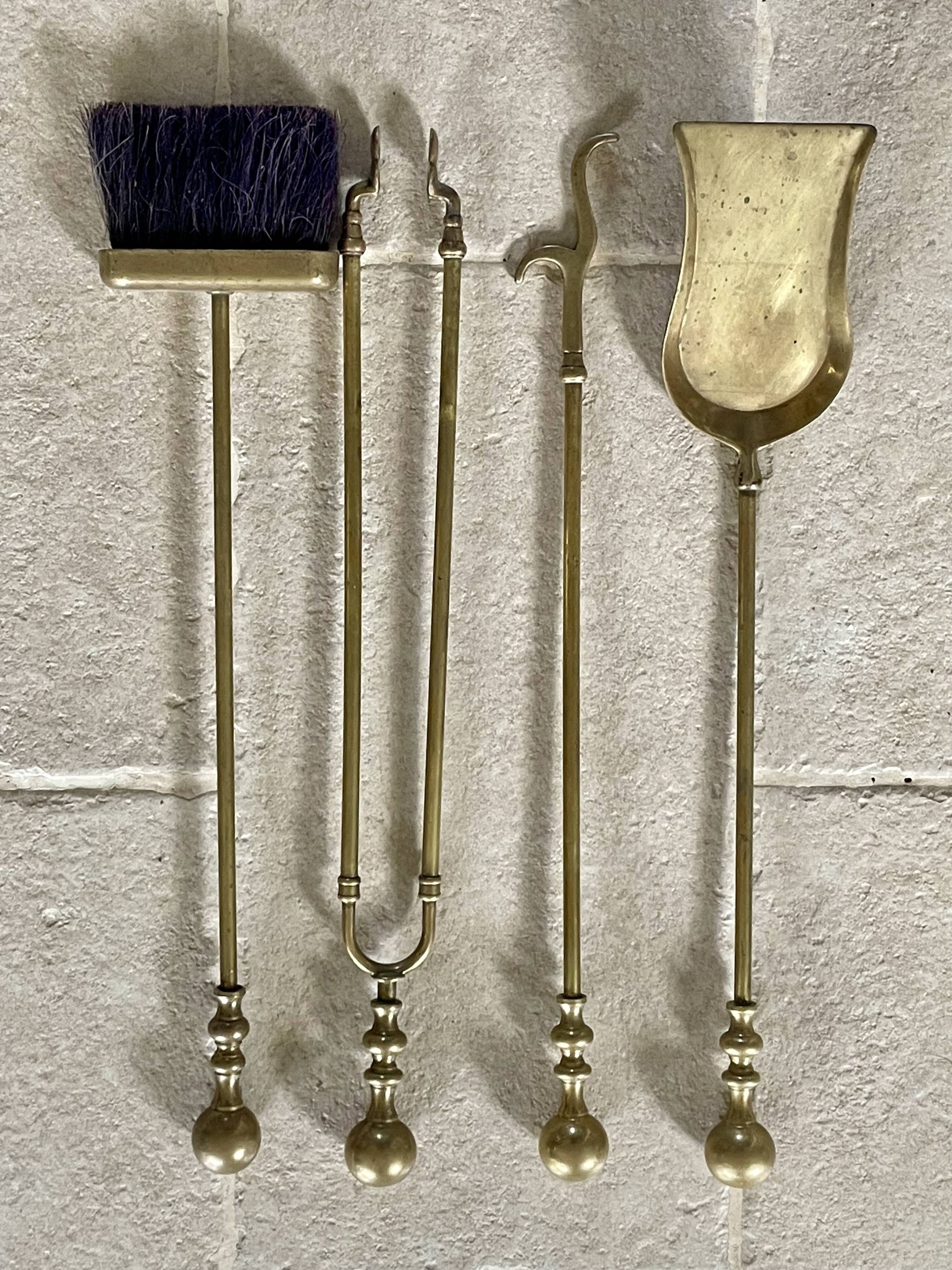 Brass fireplace accessory set with vintage stand