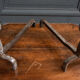 Pair of 1930 modernist chenets decorated with a ball