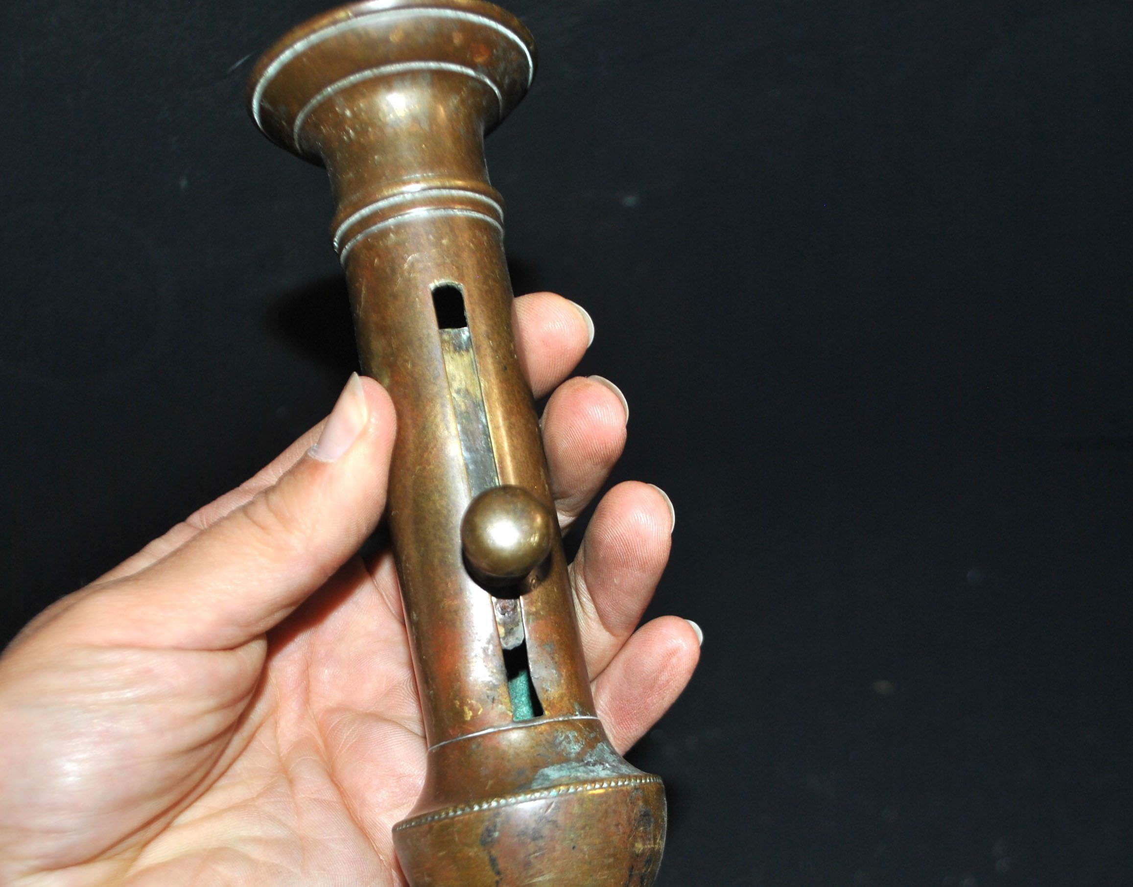 Antique push candle holder, 18th century gilded carved bronze candlestick.