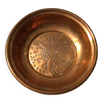 Old copper colander