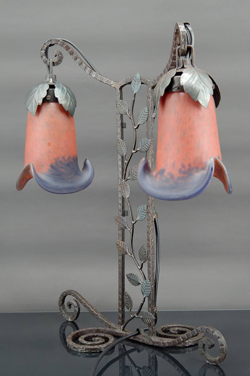 Two-headed wrought iron lamp by Muller, Art Deco, France, Circa 1920