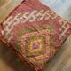 Moroccan Berber pouf colorful terracotta orange and bohemian green