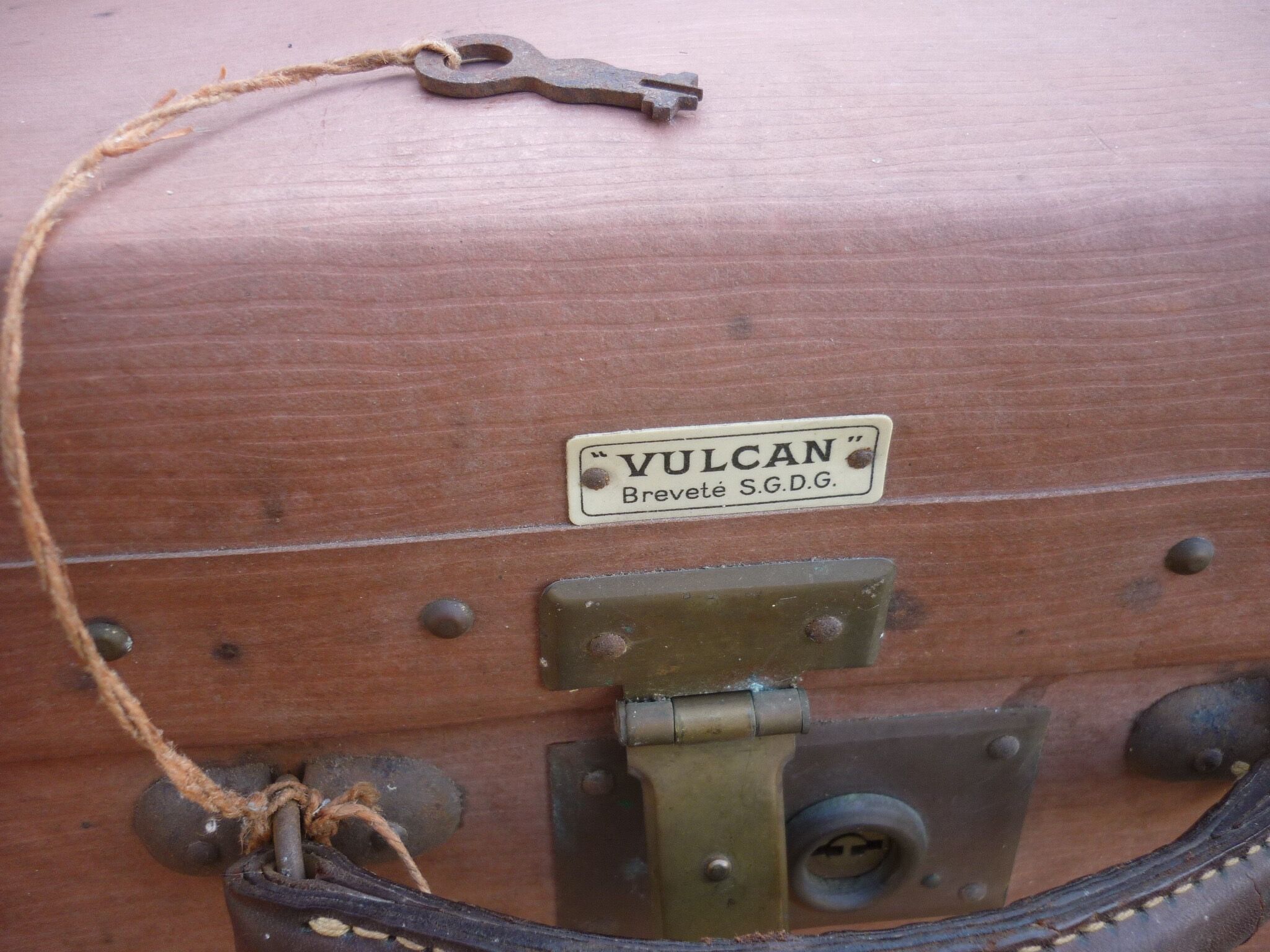 Green cardboard suitcase