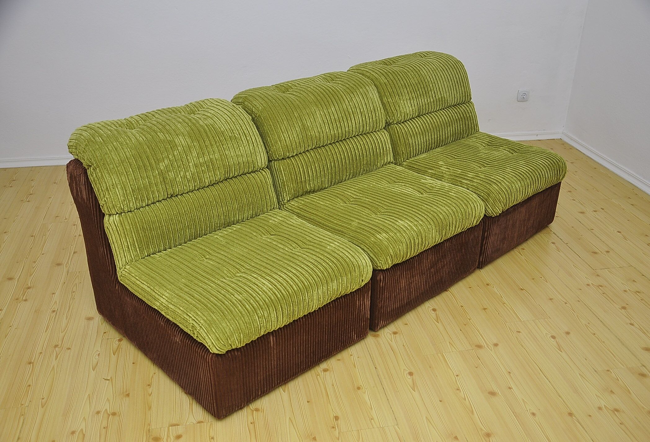 Green and brown corduroy modular sofa, 1970s.