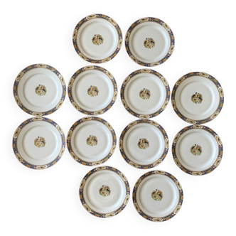 12 assiettes en porcelaine de Limoges