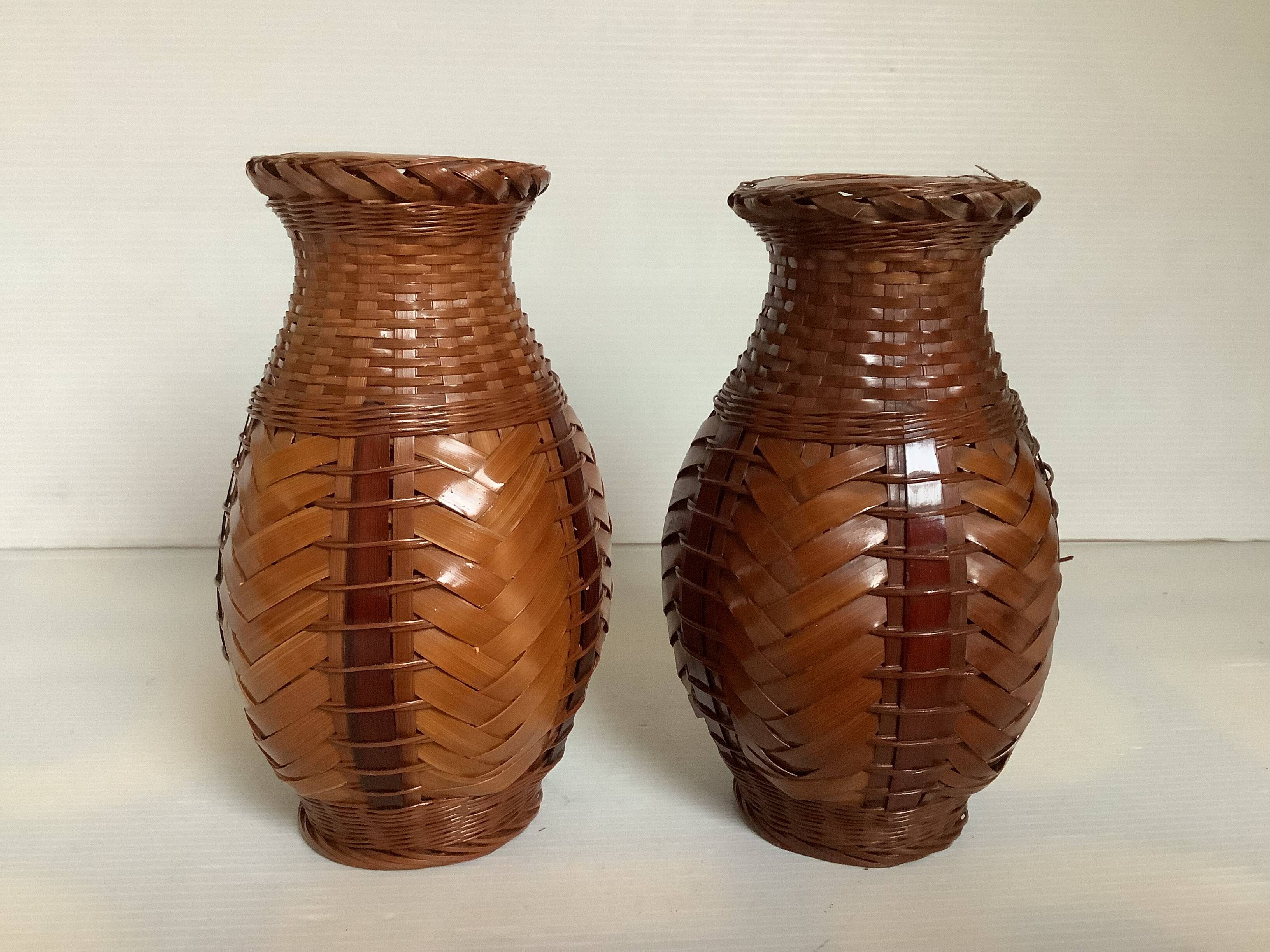 Pair of small woven vases in wicker rattan straw