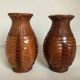 Pair of small woven vases in wicker rattan straw
