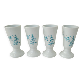 4 mazagrans en porcelaine Lourioux à décor de fleurs de myosotis