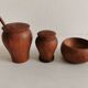 Small, beautiful lot consisting of a salt cellar, pepper shaker and honey jar.