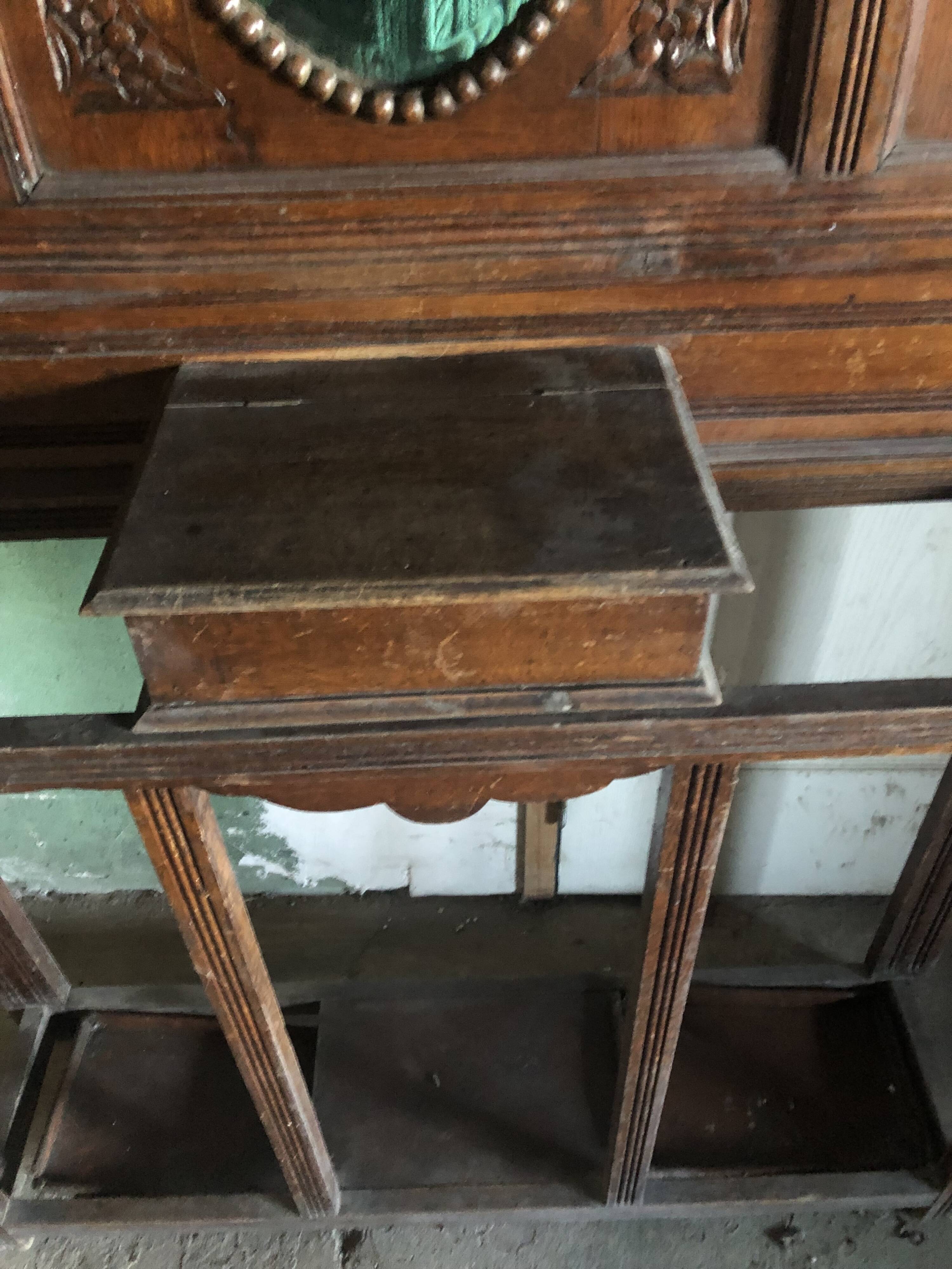 Very decorative coat rack with bevelled mirror.