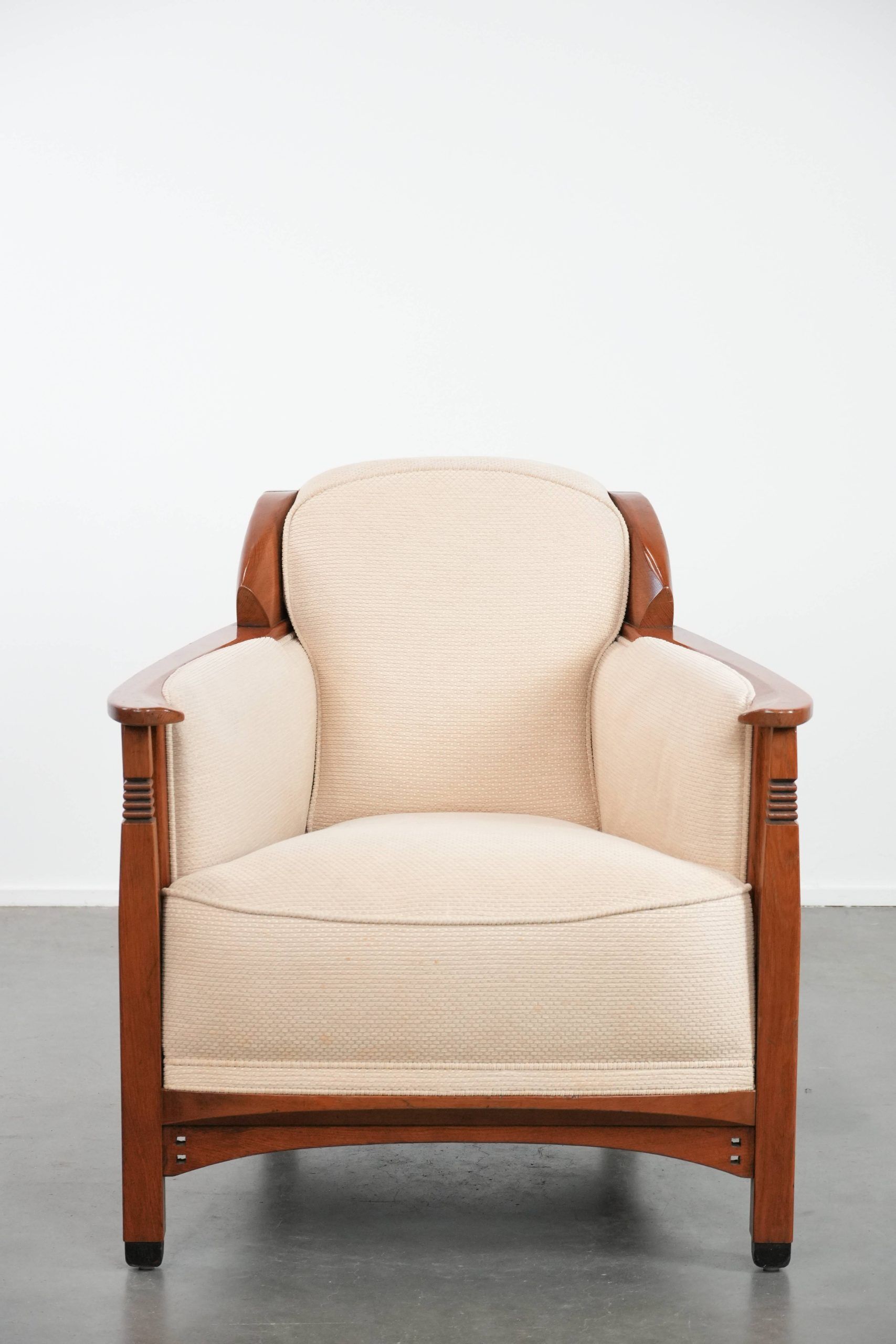 Art Nouveau design armchair with a luxurious light fabric upholstery