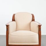 Art Nouveau design armchair with a luxurious light fabric upholstery