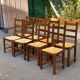 8 solid wood dining chairs with straw seats, farmhouse style