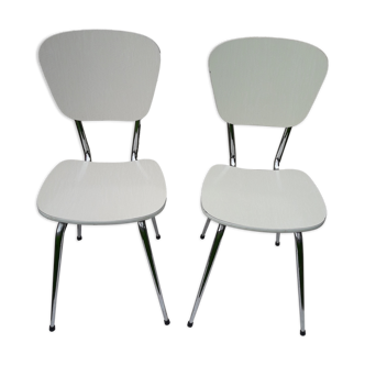 2 chairs in white formica